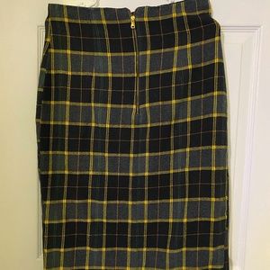 Size L Zara plaid skirt with with front slit made in Spain .